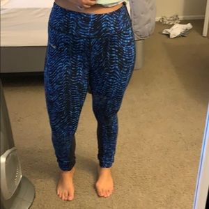 Nike DRI-FIT women’s running leggings in Medium